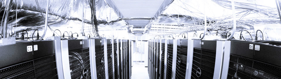 Server rack aisle with overhead cooling ductwork